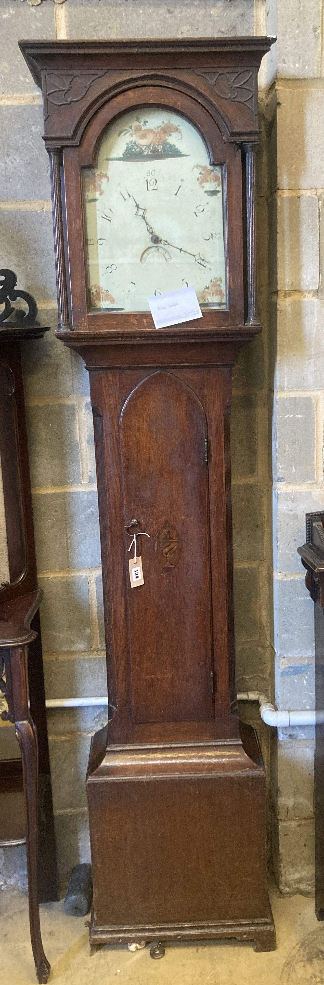 An early 19th century oak longcase clock, height 212cm